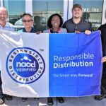 Soltex employees with NACD flag, Chemical Distribution Industry